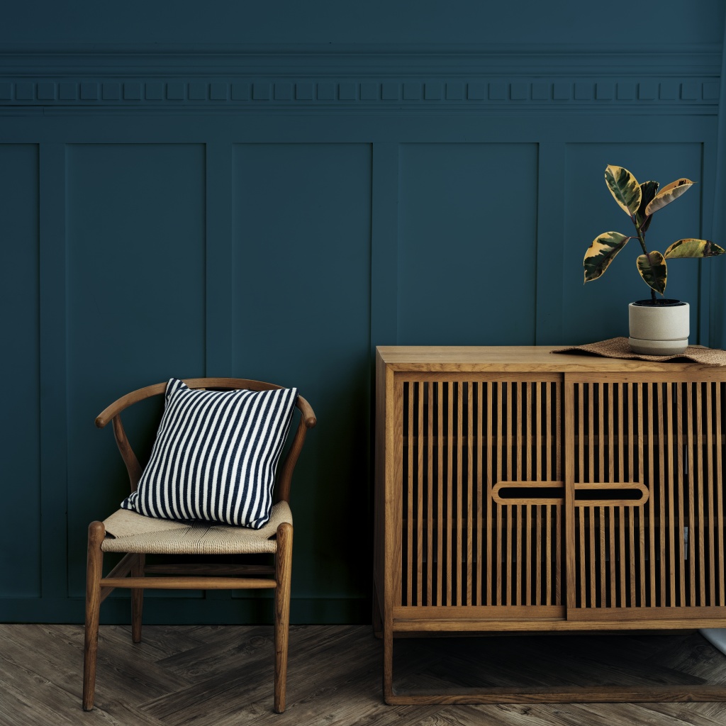 scandinavian-vintage-wood-cabinet-with-chair-by-dark-blue-wall.jpg стул